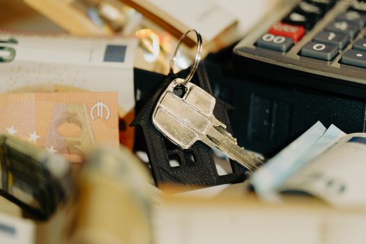 Rekenvoorbeeld van een annuïteitenhypotheek met maandlasten, rente en aflossing op papier en calculator